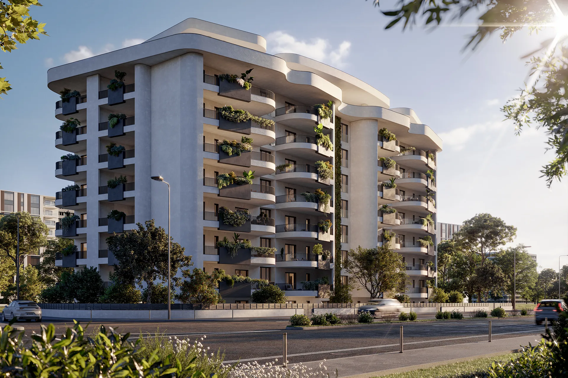 Fonte Laurentina: edificio residenziale moderno con balconi curvi e piante verdi su ogni balcone, strada traffico e alberi circostanti in una giornata soleggiata.